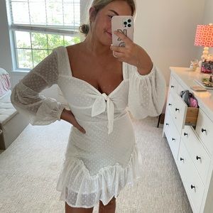 White long sleeve dress with tie and puff sleeves